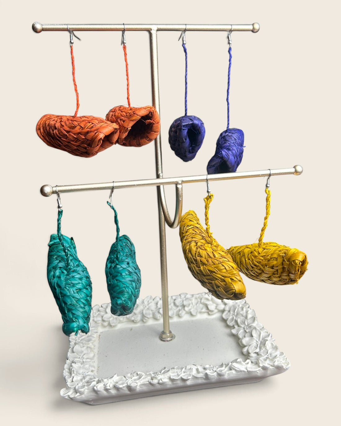 Hand-woven raffia earrings in terracotta, cobalt, teal and saffron, made in Nigeria