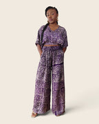 Simi Amethyst Medallion — wide-leg trouser set in hand-dyed Adire, front view, hands in pockets, L'atelier KaAy
