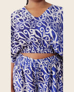 Simi Delft Scroll — hand-dyed Adire fabric detail, crisp white scrolls on cobalt, close-up of the V-neck crop top and waistband, L'atelier KaAy