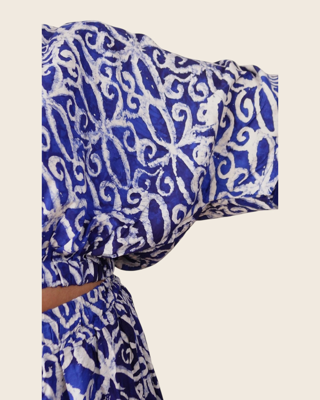 Simi Delft Scroll — hand-dyed Adire fabric detail, crisp white scrolls on cobalt, close-up of the batwing sleeve, L'atelier KaAy