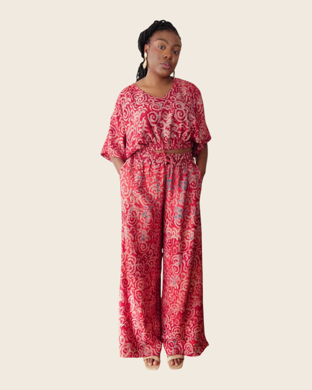 Simi Garnet Swirl — wide-leg trouser set in hand-dyed Adire, front view, hands in pockets, L'atelier KaAy