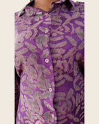 Adunni Violet Smoke — hand-dyed Adire fabric detail, smoky grey and mauve motifs on vivid violet, close-up of the collar and buttons, L'atelier KaAy