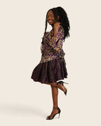 Aïna Plum Moss — african print skirt set in hand-dyed Adire, side view, one heel raised, L'atelier KaAy