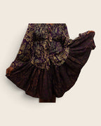 Aïna Plum Moss — african print skirt set in hand-dyed Adire, close-up of the pleated skirt held out, L'atelier KaAy