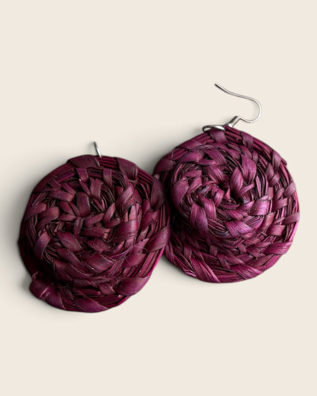 Close-up of the coiled spiral on Raspberry Pink raffia halo earrings, L'atelier KaAy