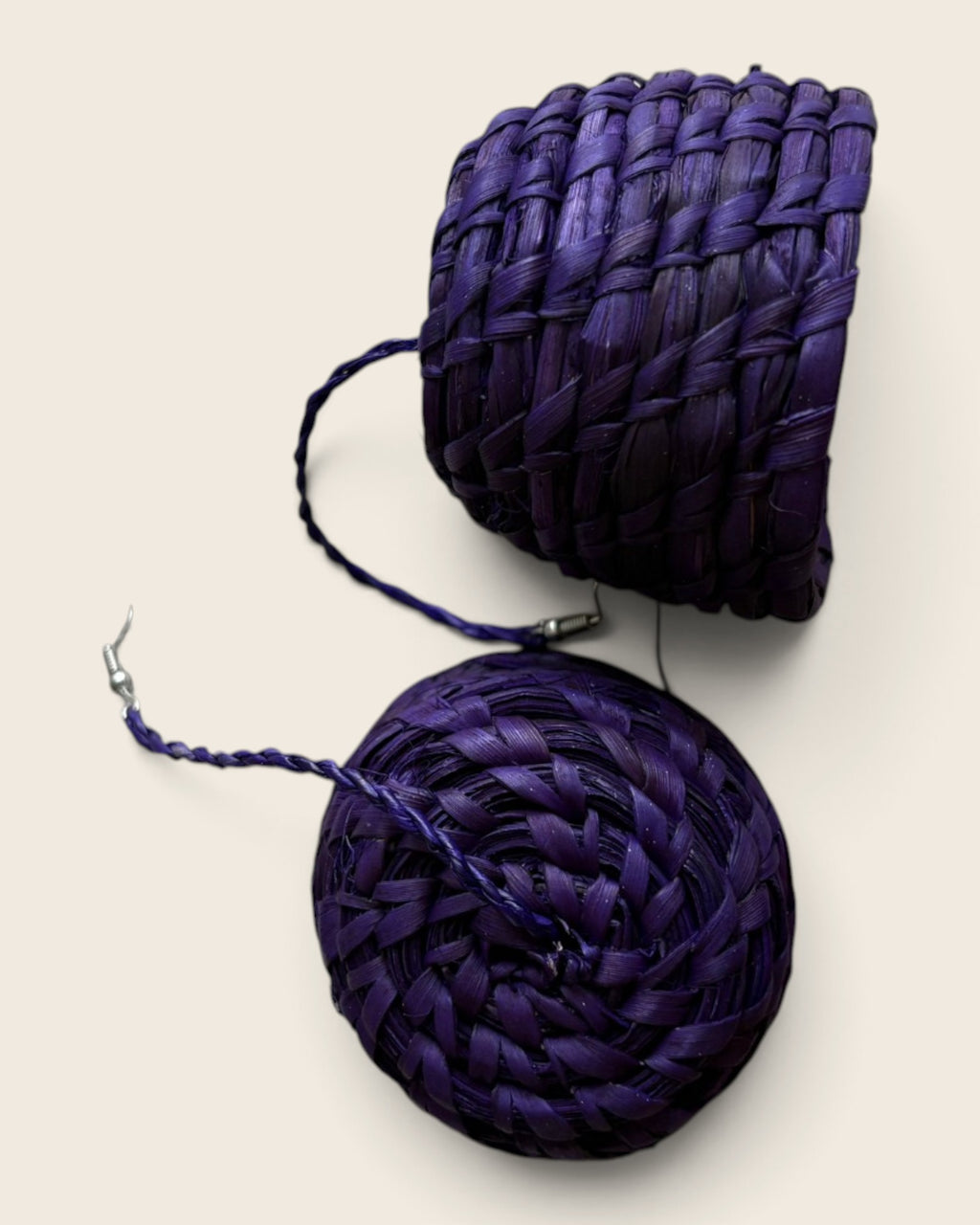Royal purple woven raffia bell drop earrings on their fine braided cords, detail view, L'atelier KaAy