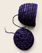 Royal purple woven raffia bell drop earrings on their fine braided cords, detail view, L'atelier KaAy