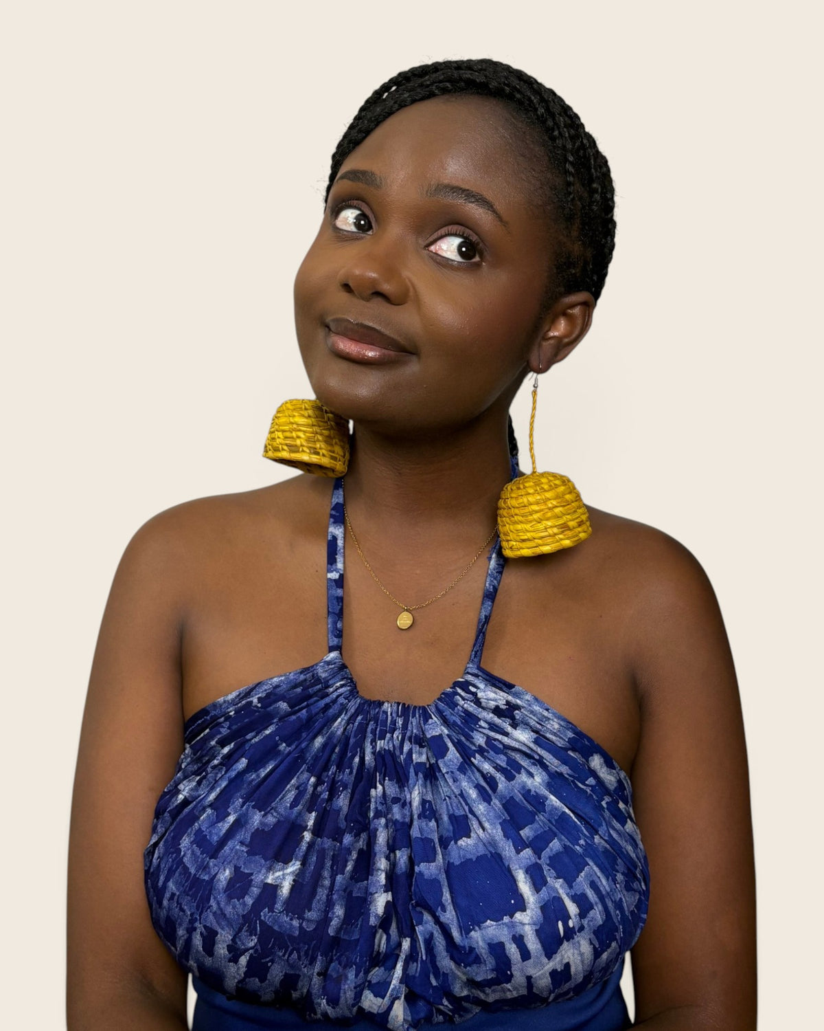Saffron Gold raffia bell earrings worn with hair swept back, L'atelier KaAy